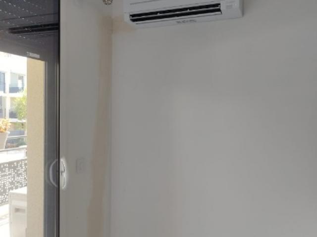 Installation discrète d'un Trisplit  par Clim'Kong Services